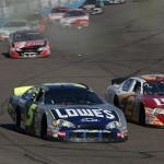 Kyle Busch (5) battles Clint Bowyer (2) during early action on his way to win the NASCAR Busch Series Arizona.Travel 200 auto race at Phoenix International Raceway on Saturday, Nov. 10, 2007 in Avondale, Ariz. (AP Photo/Rick Scuteri)