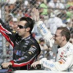 Indianapolis 500 winners Sam Hornish Jr., left, and Jacques Villeneuve, of Canada, wave to the during pre-race events for the NASCAR Nextel Cup Series' Checker Auto Parts 500 auto race at Phoenix International Raceway on Sunday, Nov. 11, 2007, in Avondale, Ariz. (AP Photo/Jason Babyak)

