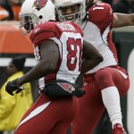 Arizona Cardinals receivers Anquan Boldin, left, and Larry Fitzgerald celebrate after Boldin caught a 44-yard touchdown pass in the first half of an NFL football game against the Cincinnati Bengals, Sunday, Nov. 18, 2007, in Cincinnati. (AP Photo/Al Behrman)