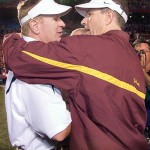 ASU coach Dirk Koetter is congratulated by Arizona coach Mike Stoops after a football game in 2006.

Wily Low/The Associated Press 