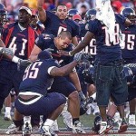 Arizona football players celebrate the closing seconds of their 34-27 win over rival ASU at Arizona Statium in Tucson in 2004.

Associated Press 