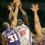 Phoenix Suns forward Shawn Marion (31), left, and Suns Grant Hill, right, defend against New York Knicks forward Zach Randolph (50) in the second quarter of their NBA basketball game in New York, Sunday, Dec. 2, 2007. (AP Photo/Kathy Willens)