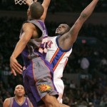Phoenix Suns forward Grant Hill (33) defends against New York Knicks forward Zach Randolph (50) in the first half of the Suns 115-104 NBA basketball victory over the Knicks at Madison Square Garden in New York, Sunday, Dec. 2, 2007. (AP Photo/Kathy Willens)