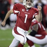 Arizona Cardinals place kicker Neil Rackers celebrates after kicking the game-winning field goal against the Atlanta Falcons in overtime of an NFL football game Sunday, Dec. 23, 2007, in Glendale, Ariz. The Cardinals won 30-27.(AP Photo/Paul Connors)