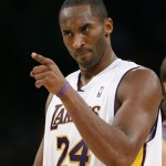 Los Angeles Lakers' Kobe Bryant gestures to a teammate in first half of their NBA basketball game against the Phoenix Suns, Tuesday, Dec. 25, 2007 in Los Angeles. The Lakers won 122-115. (AP Photo/Gus Ruelas)