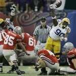 LSU defensive lineman Ricky Jean-Francois (90) blocks the field goal attempt by Ohio State kicker Ryan Pretorius (85) during the first half in the BCS championship college football game at the Louisiana Superdome in New Orleans, Monday, Jan. 7, 2008. LSU recovered on the play. (AP Photo/Charlie Riedel)
