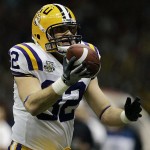 LSU tight end Richard Dickson (82) celebrates after scoring a touchdown against Ohio State during the first half of the BCS championship college football game at the Louisiana Superdome in New Orleans, Monday, Jan. 7, 2008. (AP Photo/Charlie Riedel)