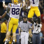 LSU tight end Richard Dickson (82) celebrates his 13-yard touchdown run against Ohio State with LSU wide receiver Brandon LaFell (1) during the BCS championship college football game at the Louisiana Superdome in New Orleans, Monday, Jan. 7, 2008. (AP Photo/Nam Y. Huh)