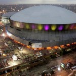 Color lights play on the Louisiana Superdome at twilight before the BCS championship college football game between LSU and Ohio State in New Orleans, Monday, Jan. 7, 2008. (AP Photo/Rob Carr)