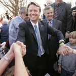 Democratic Presidential hopeful, former North Carolina Sen. John Edwards greets people following a campaign stop on the campus of Clemson University, in Clemson, S.C., Wednesday, Jan. 9, 2008. (AP Photo/Steven Senne)
