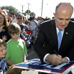 Republican presidential hopeful, former New York City Mayor Rudy Giuliani, signs autographs for supporters at the Melbourne International Airport in Melbourne, Fla., Wednesday, Jan. 9, 2008. (AP Photo/John Raoux)
