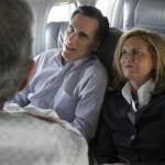Republican presidential hopeful former Massachusetts Gov. Mitt Romney and his wife Ann Romney sit aboard the campaign charter plane en route to Grand Rapids, Mich., Wednesday, Jan. 9, 2008. (AP Photo/L.M. Otero)
