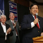 Democratic presidential hopeful, New Mexico Gov. Bill Richardson, speaks to supporters as state political advisors, George Bruno, left, and former mayor Bob Baines listen with supporters in Manchester, N.H., Tuesday, Jan. 8, 2008. Richardson ended his campaign for the presidency Wednesday after twin fourth-place finishes that showed his impressive credentials could not compete with his rivals' star power. (AP Photo/Jim Cole)