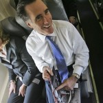 Republican presidential hopeful former Massachusetts Gov. Mitt Romney laughs with his wife Ann on a jet in Myrtle Beach, S.C., Friday, Jan. 11, 2008. (AP Photo/LM Otero)
