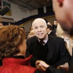 Republican presidential hopeful, Sen. John McCain, R-Ariz., greets supporters at a campaign rally at Kalamazoo Christian High School in Kalamazoo, Mich., Monday, Jan. 14, 2008. (AP Photo/Charles Dharapak)
