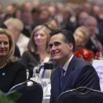 Republican presidential hopeful former Massachusetts Gov. Mitt Romney, right, sits with his wife Ann Romney as he waits to be introduced to speak at the Oakland County GOP Anniversary Gala at the Shenandoah Country Club in West Bloomfield , Mich., Monday, Jan. 14, 2008. (AP Photo/LM Otero)
