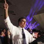 Republican presidential hopeful former Massachusetts Gov. Mitt Romney celebrates winning the Michigan presidential primary with his wife Ann Romney, left, in Southfield, Mich., Tuesday, Jan. 15, 2008. (AP Photo/LM Otero)
