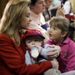 Jeri Thompson joins her husband, Republican presidential hopeful former Sen. Fred Thompson, R-Tenn., with their daughter Hayden, 4, and holding son Sammy, on the campaign Thursday, Jan. 17, 2008, in West Columbia, S.C. (AP Photo/Mary Ann Chastain)