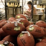 Footballs that are identical to the Super Bowl XLII game balls lie in a bin Monday, Jan. 28, 2008 at the Wilson Sporting Goods Co. factory in Ada, Ohio. The plant is the only football manufacturing factory in the U.S. The footballs are identical to the ones used during Super Bowl XLII on Sunday, Feb. 3 in Glendale, Ariz. The actual game balls have already been shipped to Arizona for the game, and these balls are being manufactured for retail sales. (AP Photo/Skip Peterson)