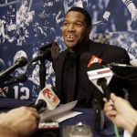 New York Giants defensive end Michael Strahan answers questions during a press conference Monday, Jan. 28, 2008 in Chandler, Ariz. The Giants will play the New England Patriots in the Super Bowl on Sunday. (AP Photo/Julie Jacobson)