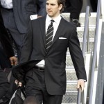 New York Giants quarterback Eli Manning arrives with his teammates Monday, Jan. 28, 2008 at Sky Harbor Airport in Phoenix. The Giants will face the New England Patriots in Super Bowl XLII in Glendale, Ariz. on Feb. 3. (AP Photo/Matt York)