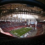 University of Phoenix Stadium is seen during media day for the Super Bowl XLII football game Tuesday, Jan. 29, 2008, in Glendale, Ariz,. (AP Photo/Charlie Riedel)