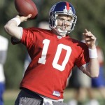 New York Giants quarterback Eli Manning passes the ball during football practice Wednesday, Jan. 30, 2008 in Tempe, Ariz. The Giants play the New England Patriots in Super Bowl XLII on Sunday, Feb. 3, in Glendale, Ariz. (AP Photo/Julie Jacobson)