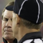 New England Patriots head coach Bill Belichick, left, looks at side judge Larry Rose during the third quarter of the Super Bowl XLII football game against the New York Giants at University of Phoenix Stadium on Sunday, Feb. 3, 2008 in Glendale, Ariz. (AP Photo/David J. Phillip)