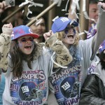 Ashley Gaffney, 12, right, and her friend Kaitlyn Curci, 12, left, cheer as the New York Giants' arrive for a parade celebrating the Giants Super Bowl victory over the New England Patriots Tuesday, Feb. 5, 2008 in New York. (AP Photo/Frank Franklin 