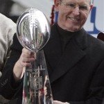 New York Giantscoach Tom Coughlin holds the Vince Lombardi Trophy during a Super Bowl parade in New York on Tuesday, Feb. 5, 2008. Manning was the most valuable player as the Giants defeated the New England Patriots, 17-14, in Sunday's National Football League championship game. (AP Photo/Gary He)
 