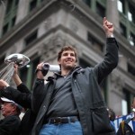 New York Giants quarterback Eli Manning celebrates during a Super Bowl parade in New York on Tuesday, Feb. 5, 2008. Manning was the most valuable player as the Giants defeated the New England Patriots, 17-14, in Sunday's National Football League championship game. (AP Photo/Gary He)
