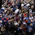Fans cheer as the Super Bowl Champion New York Giants receive a ticker tape parade in Lower Manhattan through the "Canyon of Heroes" Tuesday, Feb. 5, 2008 in New York. (AP Photo/Jason DeCrow)
