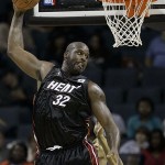Miami Heat's Shaquille O'Neal (32) grabs a pass as he looks for the basket during the first half of the Heat's 91-76 loss to the Charlotte Bobcats in an NBA basketball game in Charlotte, N.C., in this Nov. 13, 2007 file photo. The Phoenix Suns have acquired Shaquille O'Neal in a stunning, blockbuster deal that sends four-time All-Star Shawn Marion and Marcus Banks to the Miami Heat. (AP Photo/Chuck Burton, file)
