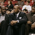 Injured Miami Heat players center Shaquille O'Neal, left, center Alonzo Mourning, center, and forward Udonis Haslem, right, watch from the bench during a basketball game against the New Jersey Nets in Miami Friday, Feb. 1, 2008. (AP Photo/Lynne Sladky)
