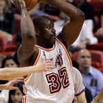 Miami Heat's Shaquille O'Neal prepares to pass against the Portland Trail Blazers in the first quarter of a basketball game in Miami, Friday, Jan. 18, 2008. The Trail Blazers won 98-91. (AP Photo/Alan Diaz)