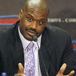 New Phoenix Suns basketball player Shaquille O'Neal pauses while answering a question at a news conference on Thursday, Feb. 7, 2008, in Phoenix. The NBA trade brought O'Neal to the Suns and sent Shawn Marion and Marcus Banks to the Miami Heat. (AP Photo/Ross D. Franklin)