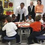 Democratic presidential hopeful Sen. Barack Obama, D-Ill., talks with students at Carver Elementary School during a tour Thursday, Feb. 7, 2008, in New Orleans. (AP Photo/Rick Bowmer)