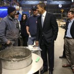 Democratic presidential hopeful, Sen. Barack Obama, D-Ill., speaks with workers during his tour of the McKinstry Company, Friday, Feb. 8, 2008, in Seattle. (AP Photo/Rick Bowmer)