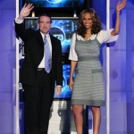 In this image released by The Tyra Banks Show, host Tyra Banks and Republican presidential hopeful Mike Huckabee wave on the set of “The Tyra Banks Show”, Thursday, Feb. 7, 2008, in New York. The program is scheduled to air on Feb. 29. (AP Photo/Warner Bros., Michael Loccisano)