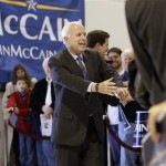 Republican presidential hopeful, Sen. John McCain, R-Ariz., greets supporters at an airport rally in Wichita, Kansas, Friday, Feb. 8, 2008. (AP Photo/Gerald Herbert)