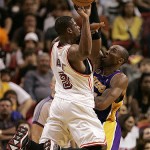 Miami Heat guard Dwyane Wade (3) passes the ball as Los Angeles Lakers guard Kobe Bryant, right, defends in the fourth quarter during a basketball game in Miami, Sunday, Feb. 10, 2008. The Lakers won 104-94. (AP Photo/Lynne Sladky)