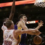 Los Angeles Lakers forward Luke Walton, right, loses control of the ball as Jason Williams (55) defends in the third quarter during a basketball game in Miami, Sunday, Feb. 10, 2008. The Lakers won 104-94. (AP Photo/Lynne Sladky)
