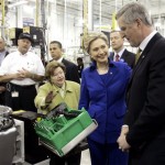 Democratic presidential hopeful Sen. Hillary Rodham Clinton, D-N.Y., third from right, listens to John Buttermore, GM Powertrain vice president of global manufacturing, right, at a campaign stop at the GM Allison Transmission Plant in White Marsh, Md., Monday, Feb. 11, 2008. From right are, Butttermore, Maryland Gov. Martin O'Malley, Clinton, Sen. Barbara Mikulski, D-Md. and Md. Lt. Gov. Anthony Brown. (AP Photo/Carolyn Kaster)
