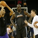 Phoenix Suns center Shaquille O'Neal, center, gets instruction from assistant coach Phil Weber, right, as teammate Grant Hill, left, shoots during practice before an NBA basketball game against the Golden State Warriors in Oakland, Calif., Wednesday, Feb. 13, 2008.(AP Photo/Marcio Jose Sanchez)