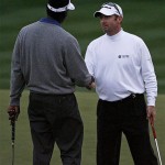 Vijay Singh, left, of Fiji, shakes hands with opponent Rod Pampling, right, of Australia, after Singh defeated Pampling by 1 in 25 holes during their match at the third round of the Accenture Match Play Championship golf tournament at The Gallery Golf Club at Dove Mountain, in Marana, Ariz., Friday.