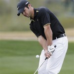 Paul Casey, of England, chips onto the 12th green during his match against K.J. Choi, during the third round of the Accenture Match Play Championship golf tournament at The Gallery Golf Club at Dove Mountain, in Marana, Ariz., Friday.