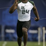 Defensive lineman Quentin Groves of Auburn runs the 40-yard dash at the NFL Combine in Indianapolis, Monday, Feb. 25, 2008. Groves rans the fastest time of the defensive linemand at 4.57 seconds. (AP Photo/Michael Conroy)