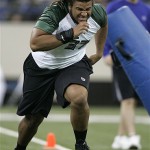Defensive lineman Trevor Laws of Notre Dame runs a drill at the NFL Combine in Indianapolis, Monday, Feb. 25, 2008. (AP Photo/Michael Conroy)