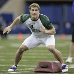 Defensive lineman Chris Long of Virginia runs a drill at the NFL Combine in Indianapolis, Monday, Feb. 25, 2008. (AP Photo/Michael Conroy)