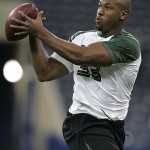 Defensive lineman Lawrence Jackson of Southern California runs a drill at the NFL Combine in Indianapolis, Monday, Feb. 25, 2008. (AP Photo/Michael Conroy)